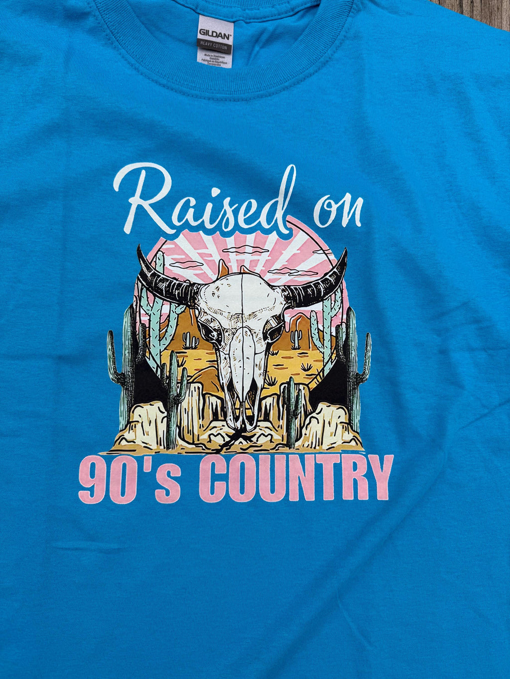 Sapphire Blue Western Graphic Tee – "Raised On 90's Country" Cow Skull Shirt (Size XL)
