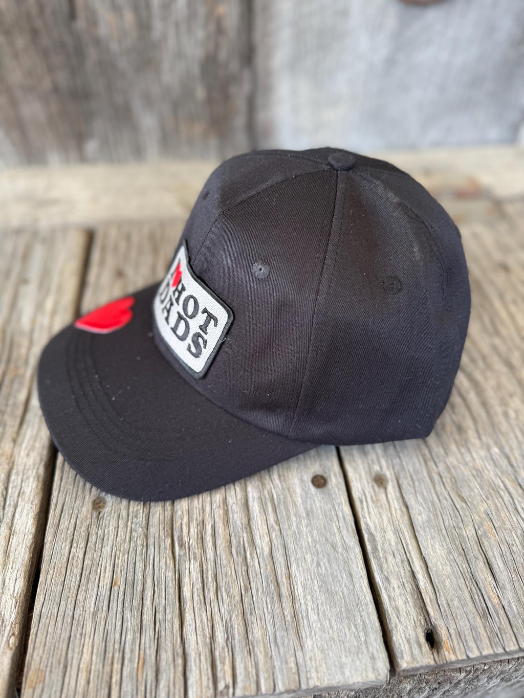 I Love Hot Dads Black Trucker Hat | Funny Iron-On Patch with Red Heart