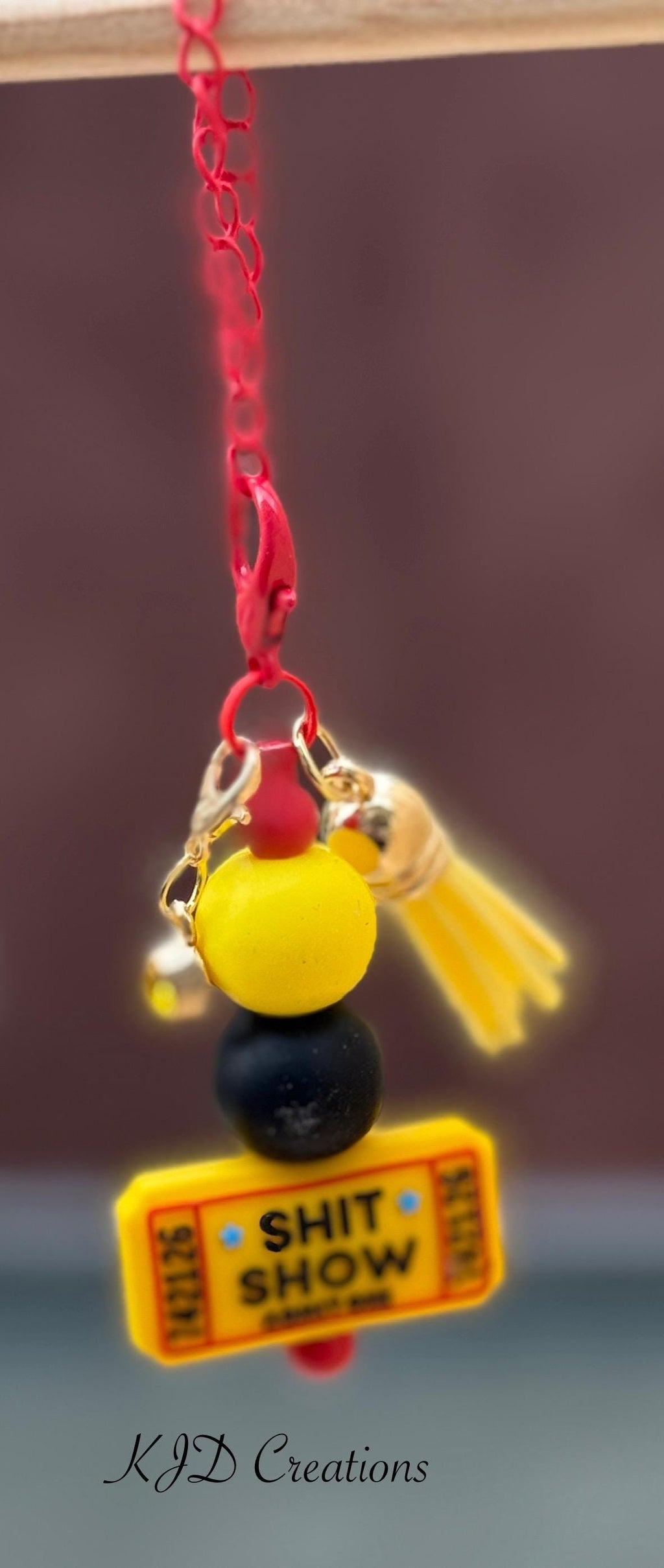 Admit One country music tumbler cup handle charm — yellow and black beads with yellow tassel on red chain