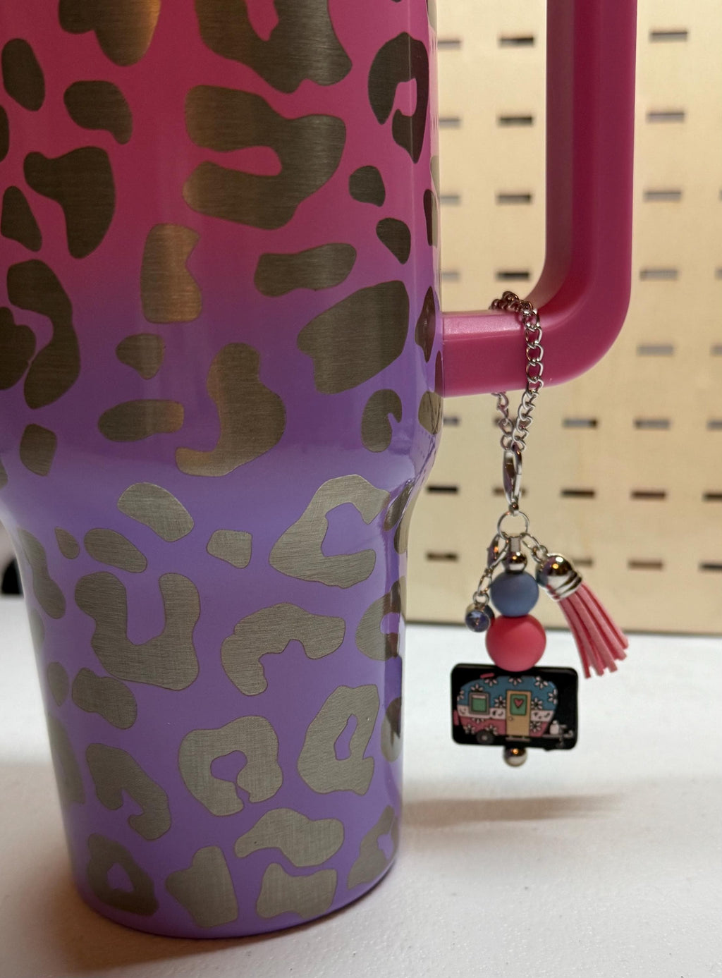 RV Happy Camper silicone beaded tumbler cup charm in black with colorful beads, miniature camper charm, and pink tassel on silver chain