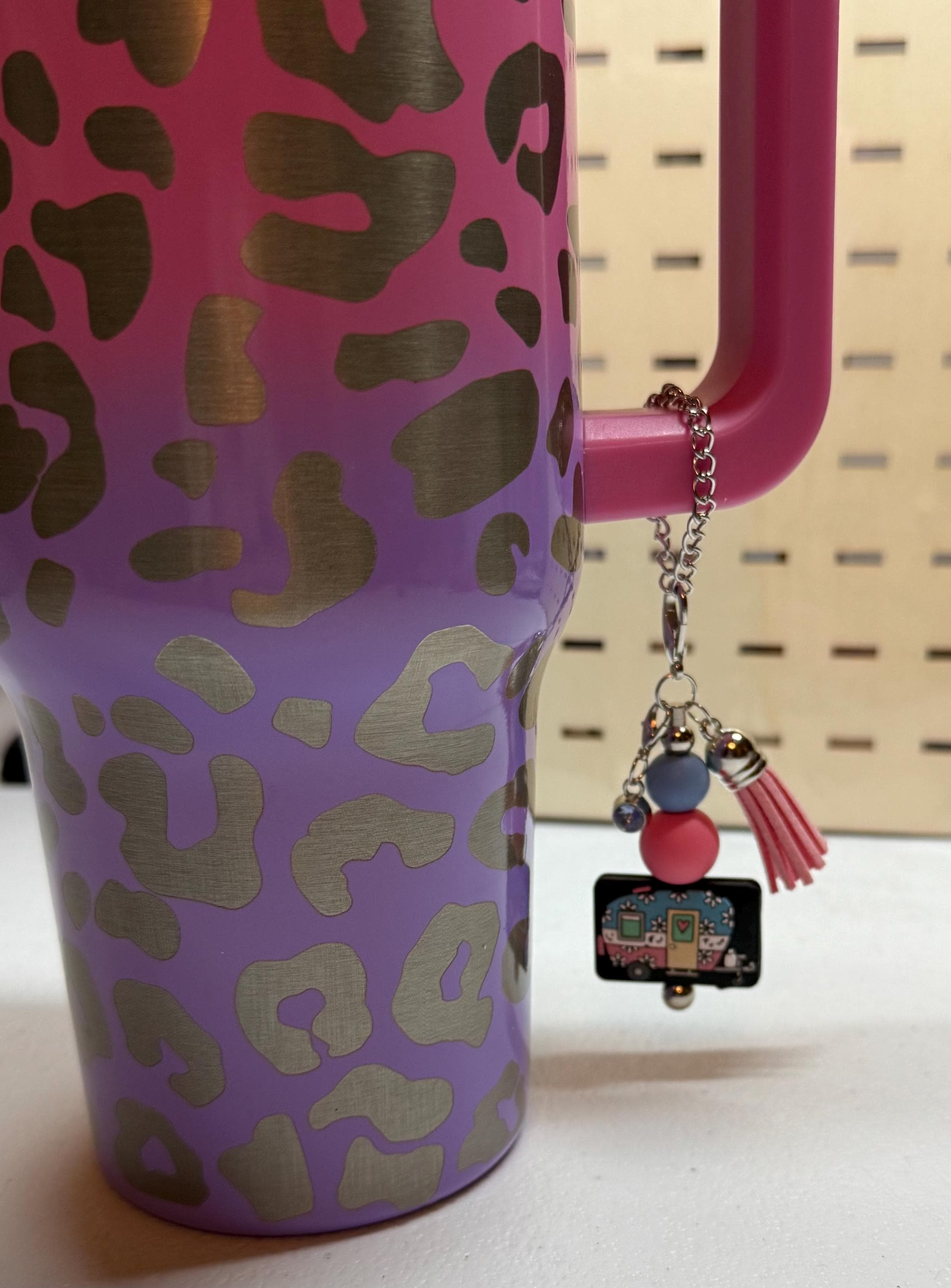 RV Happy Camper silicone beaded tumbler cup charm in black with colorful beads, miniature camper charm, and pink tassel on silver chain