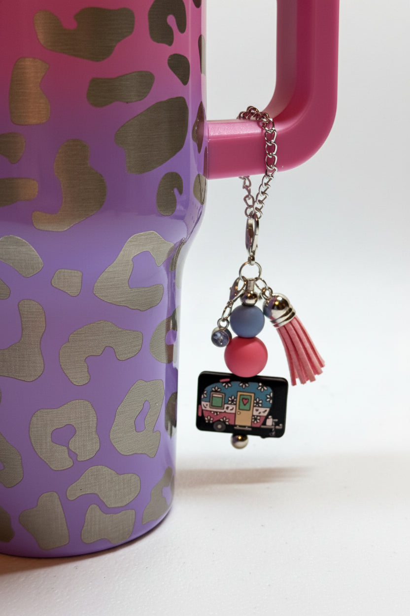 RV Happy Camper silicone beaded tumbler cup charm in black with colorful beads, miniature camper charm, and pink tassel on silver chain