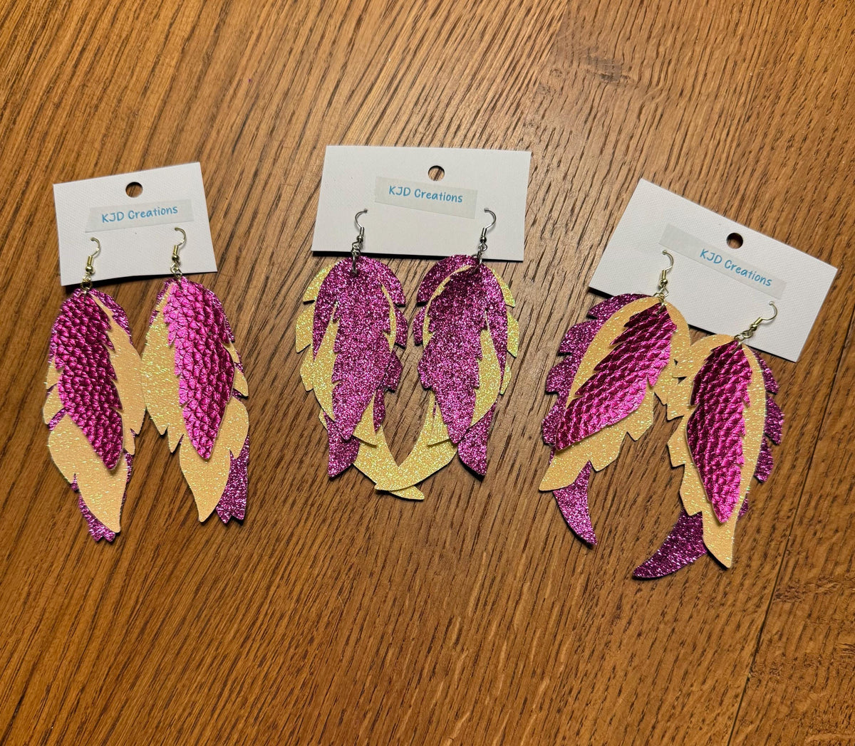 Boho Western Faux Glitter Leather Feather Dangle Earrings – Purple & Yellow Metallic