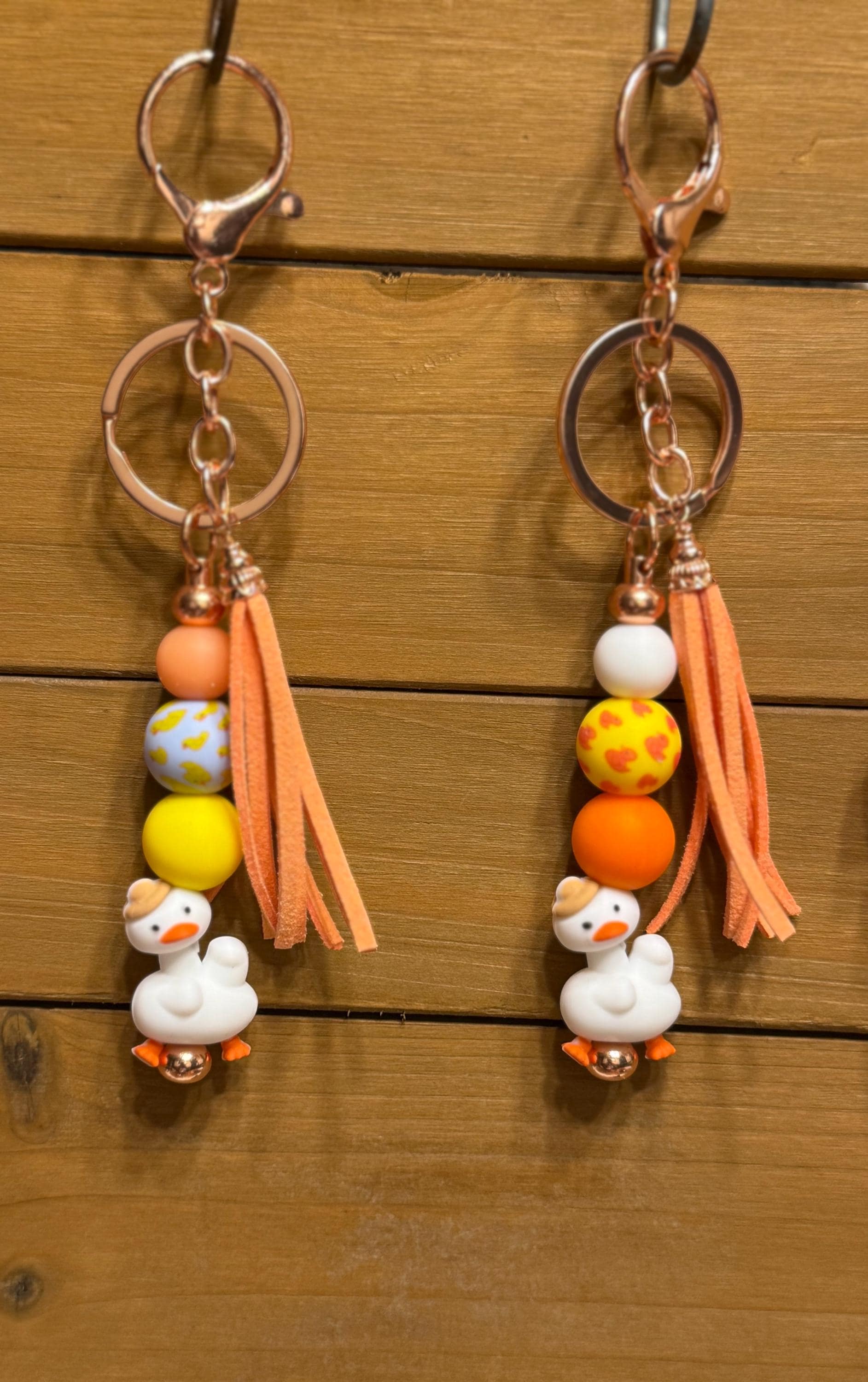 Silly Goose Silicone Beaded Keychain & Wristlet with Leather Tassel | Pink & White Goose