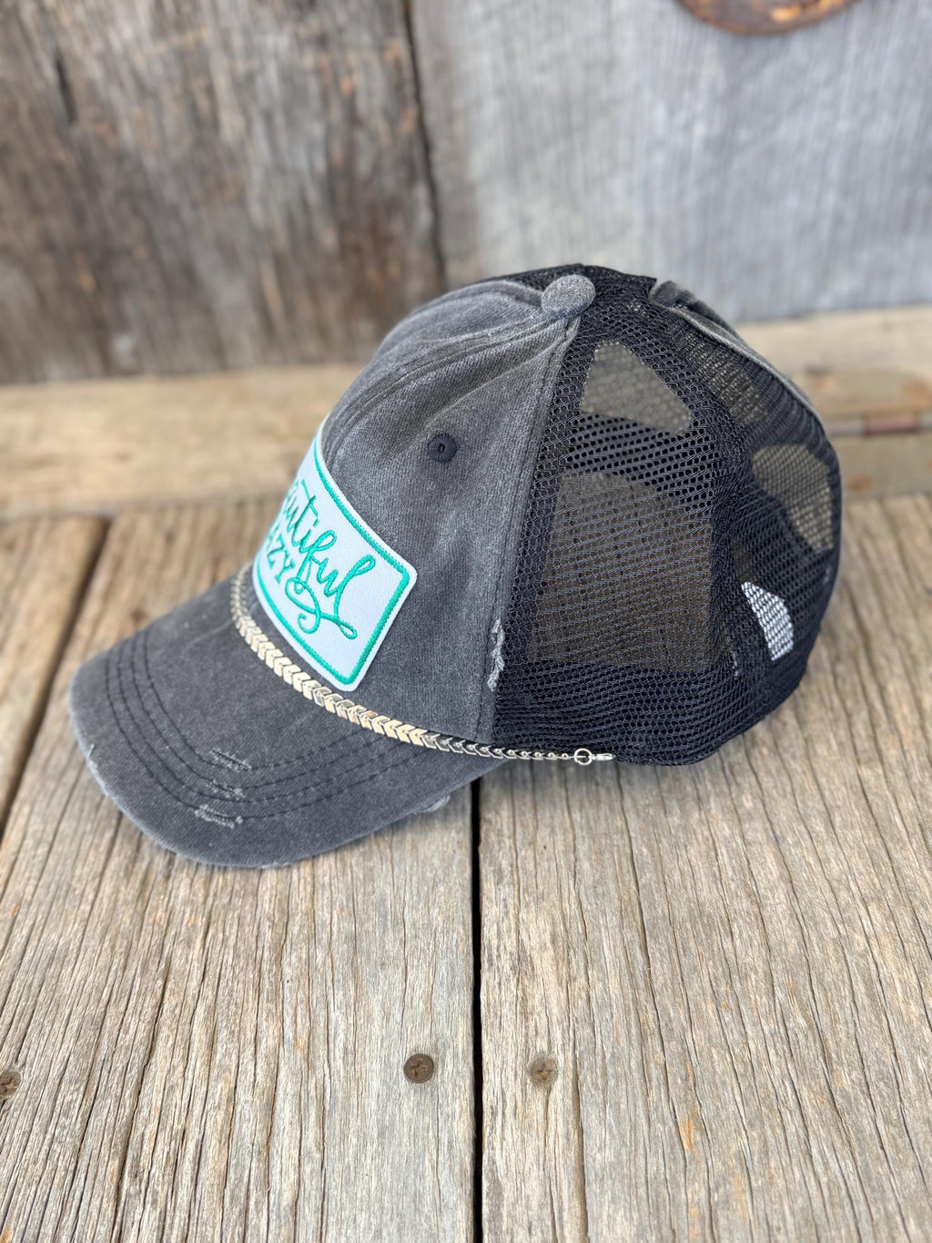 Crazy & Beautiful Distressed Black Ponytail Trucker Hat | Western Iron-On Patches & Silver Hat Chain