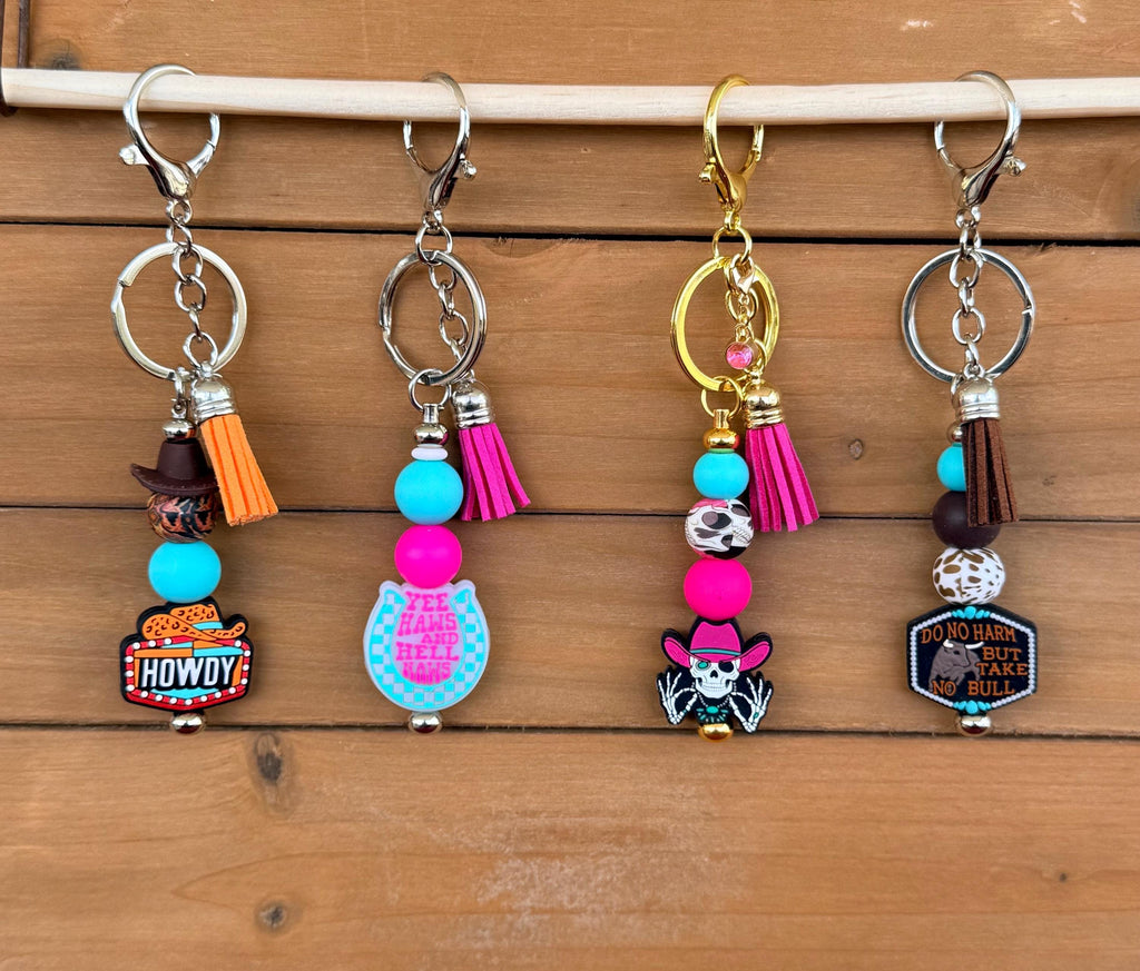 Western Sassy Sayings Silicone Beaded Keychain with Leather Tassel | Howdy, Yell Naw, Skeleton & More