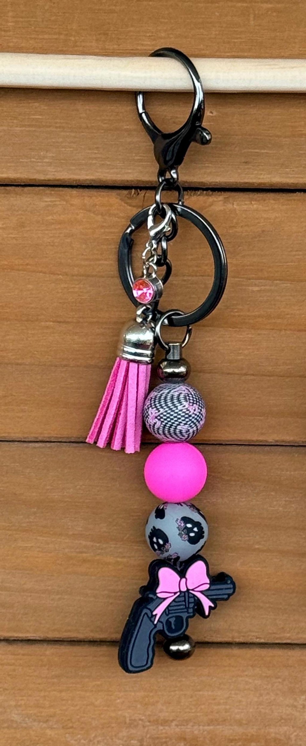 Pew Pew Pistol & Bow Silicone Beaded Keychain with Leather Tassel