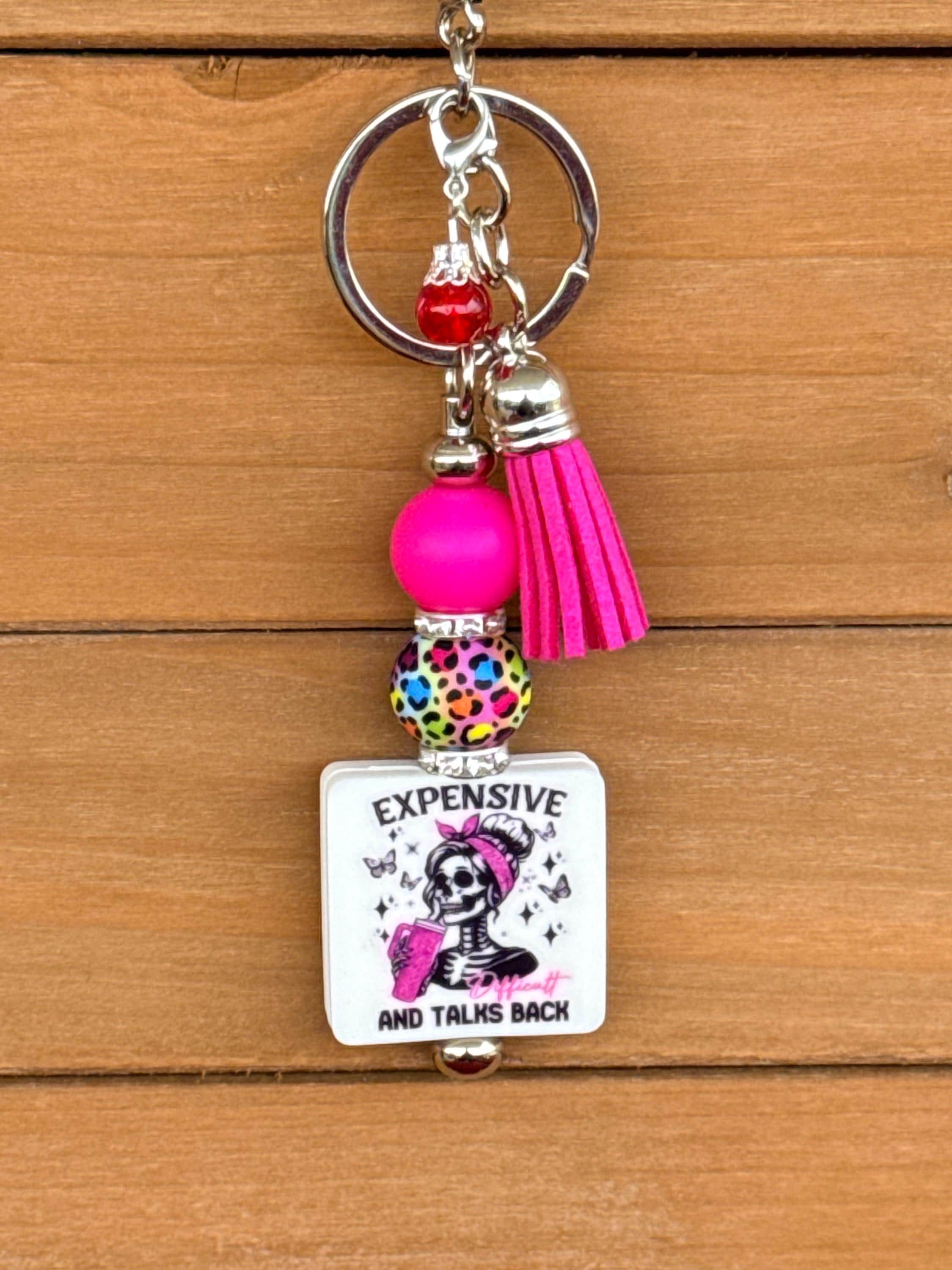 Expensive & Talks Back Bougie Silicone Beaded Keychain | Pink Cheetah Print with Leather Tassel