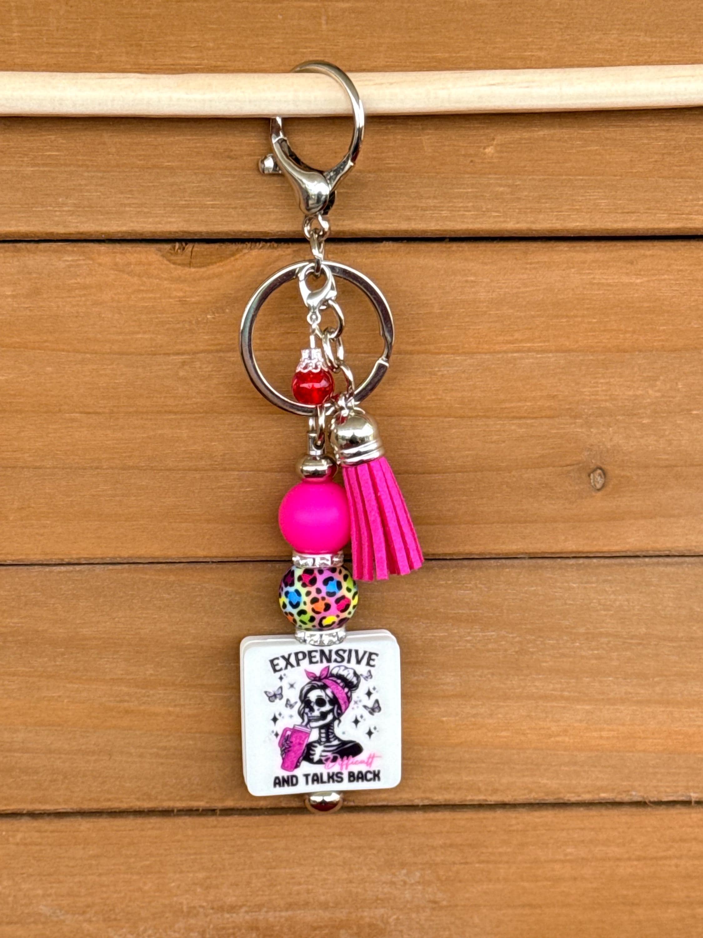 Expensive & Talks Back Bougie Silicone Beaded Keychain | Pink Cheetah Print with Leather Tassel